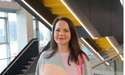 Hannah Baron with yellow staircase in the background